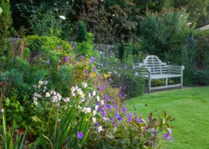 Relaxing terrace in Oxfordshire garden design with seasonal planting