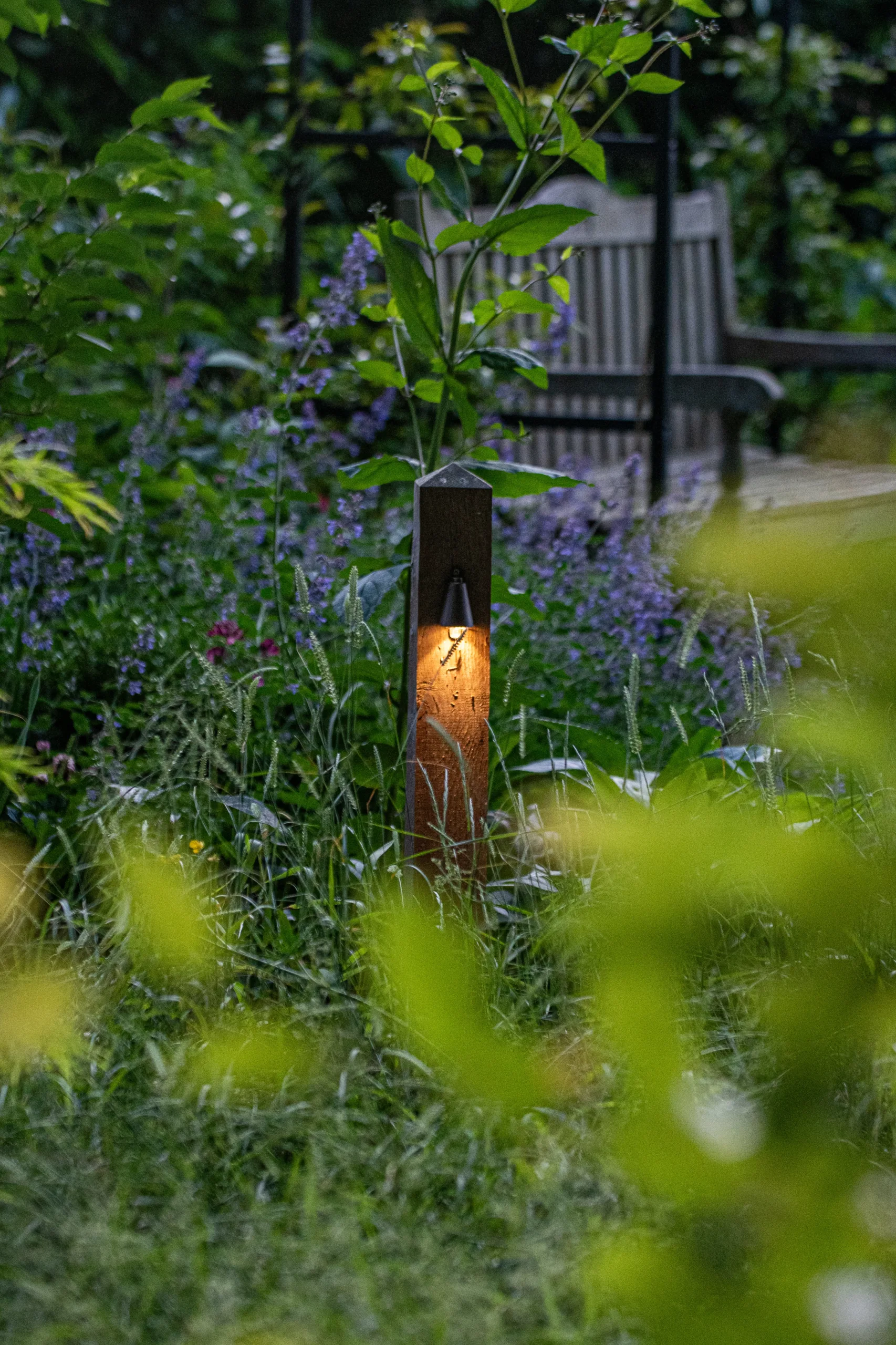 Family-friendly lawn and play area in a modern garden design