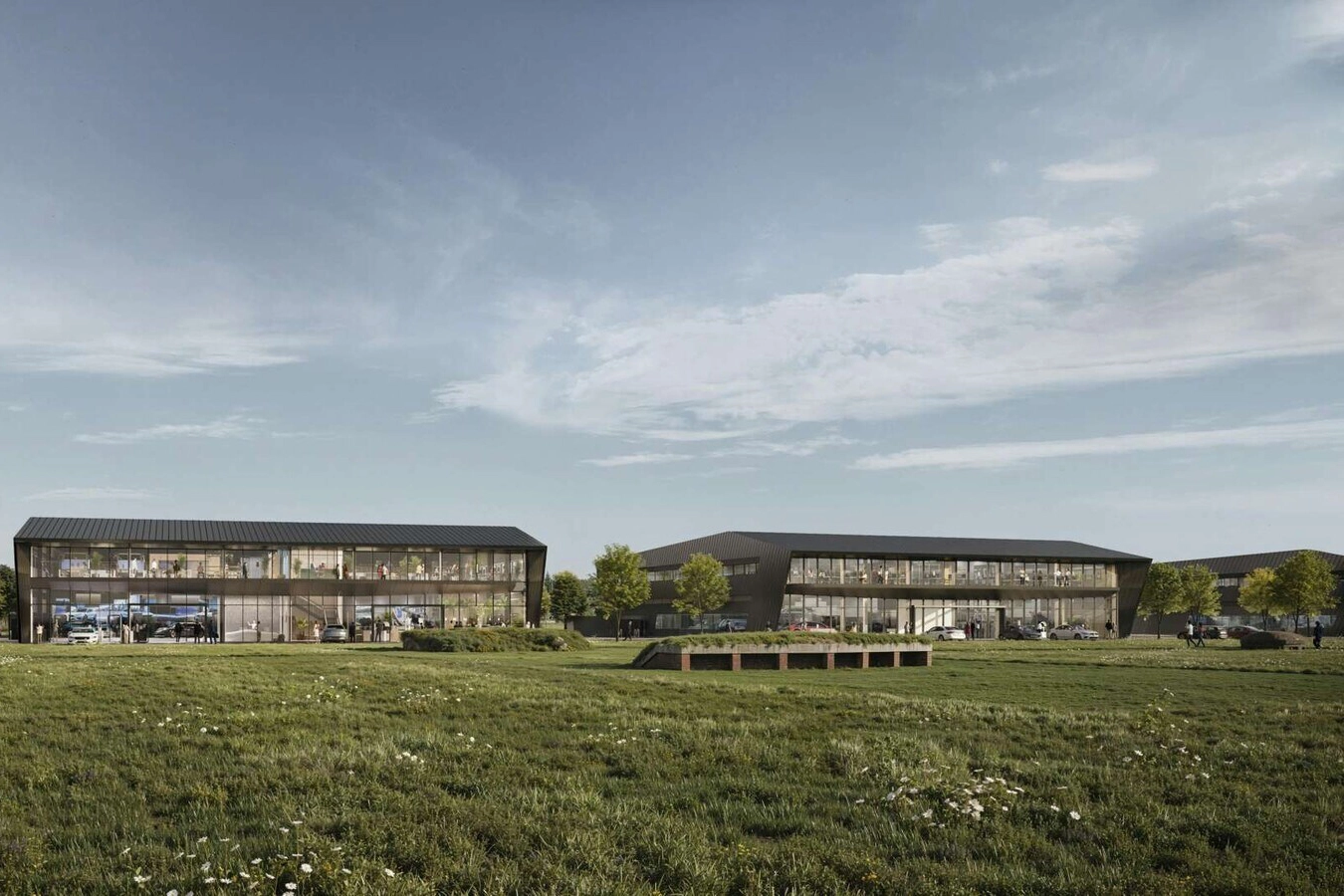 Airfield‑inspired planting and sustainable drainage at The Ranges Bicester sustainable HQ development.